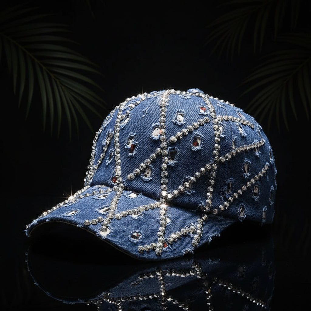Two denim baseball caps with a diamond-shaped rhinestone pattern, one in light blue and one in dark blue, on a white background.