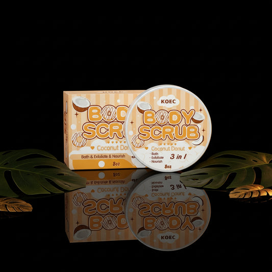 A container of Strawberry Cake body scrub cream next to its packaging box, both featuring a pink color scheme with strawberry illustrations.