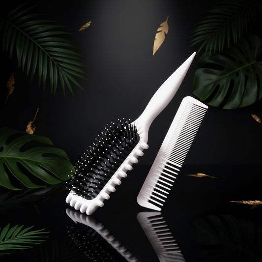 A white air cushion hair brush with teeth, designed for hairstyling.