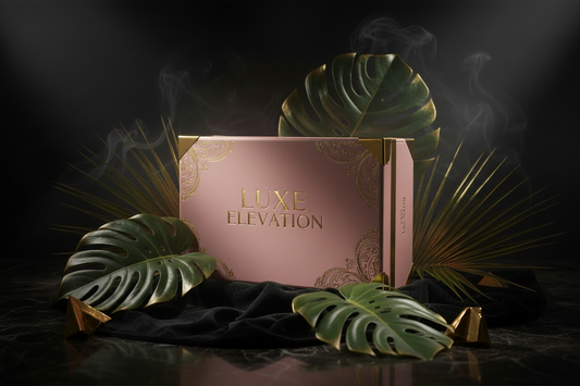 Pink box labeled 'Luxe Elevation' with gold accents on a dark background