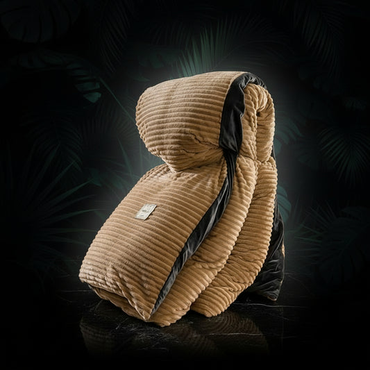 A person embracing a beige velvet duvet cover with black trimmings, displayed in a bedroom setting.