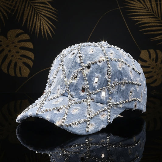Two denim baseball caps with a diamond-shaped rhinestone pattern, one in light blue and one in dark blue, on a white background.