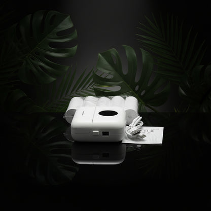 A portable mini thermal printer in pink color, showing the front, side, and back views with dimensions.