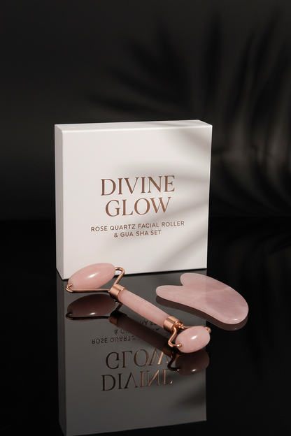 Pink rose quartz facial roller and Gua Sha set with 'Divine Glow' packaging on a pink background