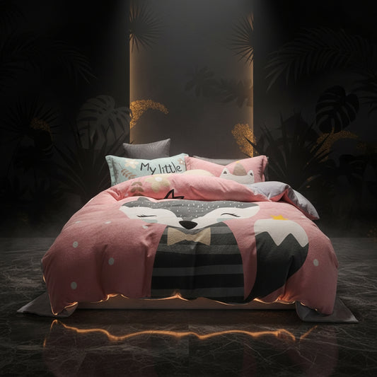 A four-piece bed sheet set with a cartoon theme, featuring a blue color with white polka dots and text, displayed on a bed with pillows and a quilt.