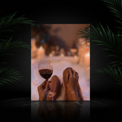 Person holding a glass of wine with text about self-care, blurred background