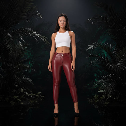 A pair of beige, faux leather skinny leggings with a high waist and ankle-length design, showcased on a model.