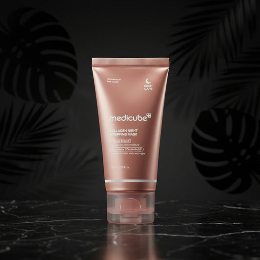 A tube of Medicube Collagen Night Wrapping Mask with pink and white packaging.