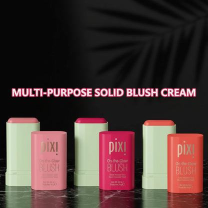 The image shows a collage of two models demonstrating the use of Pixi brand blush sticks. The models are shown with the blush applied to their cheeks, and the blush sticks are displayed in three shades corresponding to the colors on the models' cheeks.
